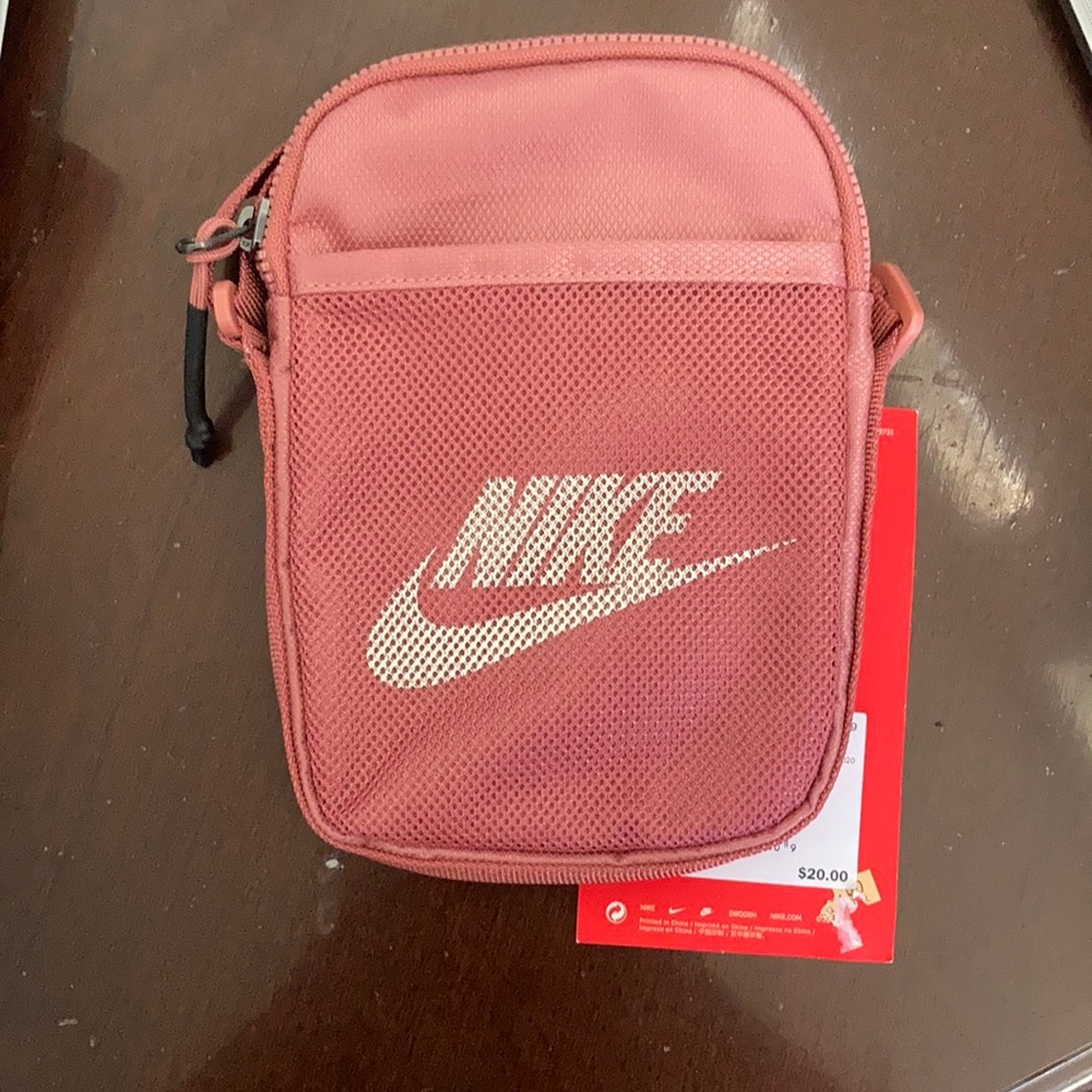 Nike crossbody bag in rose color.